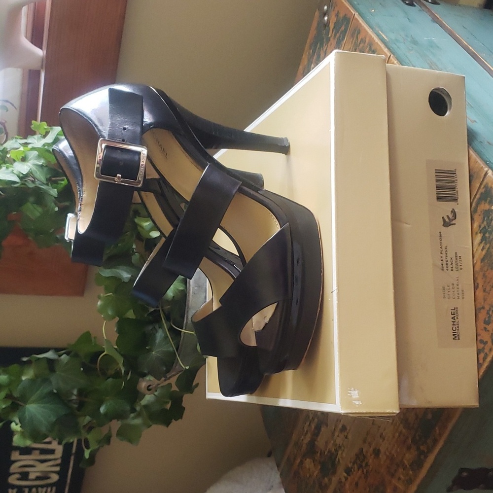 Black open toed leather pumps